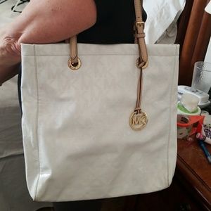 MK logoed patten leather purse